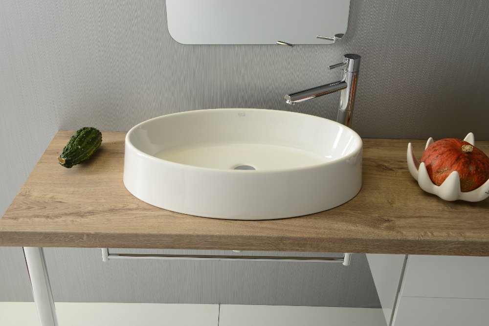 Oval keramické umývadlo 64,5x13x35,5 cm na dosku bez prepadu